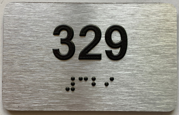 apartment number 329 sign