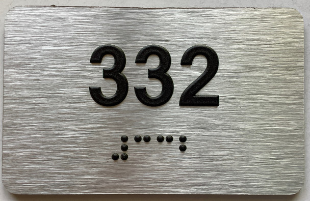 apartment number 332 sign