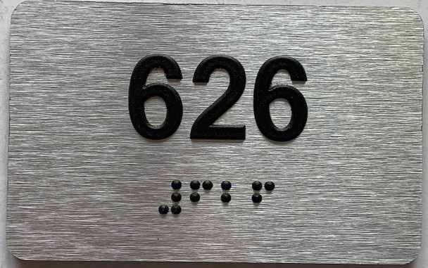 apartment number 626 sign