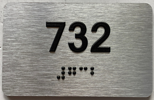 apartment number 732 sign