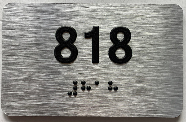 apartment number 818 sign