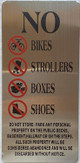 NO BIKES, STROLLERS BOXES, NO STOARGE IN HALLWAY COMPLIANCE SIGN