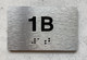 APT NUMBER 1B COMPLIANCE SIGN-UNIT NUMBER COMPLIANCE SIGN WITH RAISED LETTERS