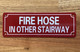 NYC FIRE HOSE IN OTHER STAIRWAY SIGN