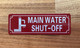 MAIN WATER SHUT-OFF WITH SYMBOL SAFETY SIGN