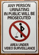 ANY PERSON URINATING IN PUBLIC WILL BE PROSECUTED -NO PUBLIC URINATION SAFETY SIGN
