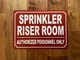 SPRINKLER RISER ROOM COMPLIANCE SIGN