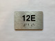 Apartment Number unit 12E Compliance Sign