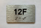 Apartment Number unit 12F Compliance Sign