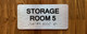 Storage Room 4 Sign with Raised Letters & Grade 2 Safety Sign