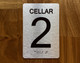 Cellar 2 Sign with Raised Letters & Grade 2 Hpd Sign