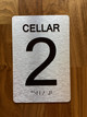 Cellar 2 Sign with Raised Letters & Grade 2 Compliance Sign