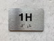 APT# 1H Compliance Sign