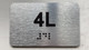 APT# 4L Braille Sign