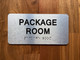 The Package Room Sign with Raised Letters & Grade 2 Compliance Sign