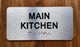 The Main Kitchen with Raised Letters & Grade 2 Safety Sign
