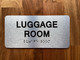 The Luggage Room with Raised Letters & Grade 2 Compliance Sign