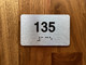 Apartment number 135 Compliance Sign