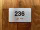 Apartment number 236 Compliance Sign