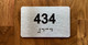 Apartment number 434 Braille Sign