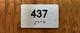 Apartment number 437 Ada Sign