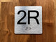 2R Elevator Jamb Plate Compliance Sign