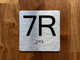 7R Elevator Jamb Plate Compliance Sign