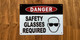 white-danger-safety-glasses-requi-screw-mount-sign.jpg