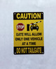 5x7-caution-gate-will-only-allow-one-vehicle-at-a-time-do-not-tailgate-metal-identification-sign.jpg