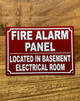 fire-alarm-panel-located-in-basement-electrical-room-aluminum-identification-sign.jpg