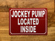 jockey-pump-located-inside-aluminum-identification-sign.jpg