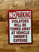 no-parking-violators-will-be-towed-at-owners-expense-nyc-5x7-mounting-holes.jpg