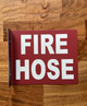 fire-hose-3d-projection-hallway-red-safety-sign.jpg