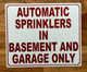 automatic-sprinkler-in-basement-and-garage-only-white-safety-sign.jpg