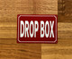 drop-box-sign-10-x-7-inches-mounting-holes.jpg