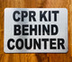 cpr-kit-behing-counter-5-x-7-self-adhesive-metal-sign.jpg