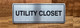 silver-utility-closet-door-sign-with-tape.jpg