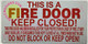 THIS IS A FIRE DOOR KEEP CLOSED  Signage