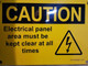 Electrical panel area must be kept clear at all times  Signage