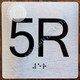 Apartment Number 5R  with Braille and Raised Number Signage