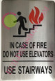 FD IN CASE OF FIRE DO NOT USE ELEVATOR SIGN