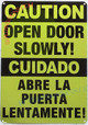 FD Sign CAUTION: OPEN DOOR SLOWLY ENGLISH/SPANISH