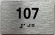 suite 107 sign