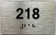 suite 218 sign