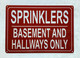 NYC SPRINKLERS IN BASEMENT AND HALLWAYS ONLY SIGN