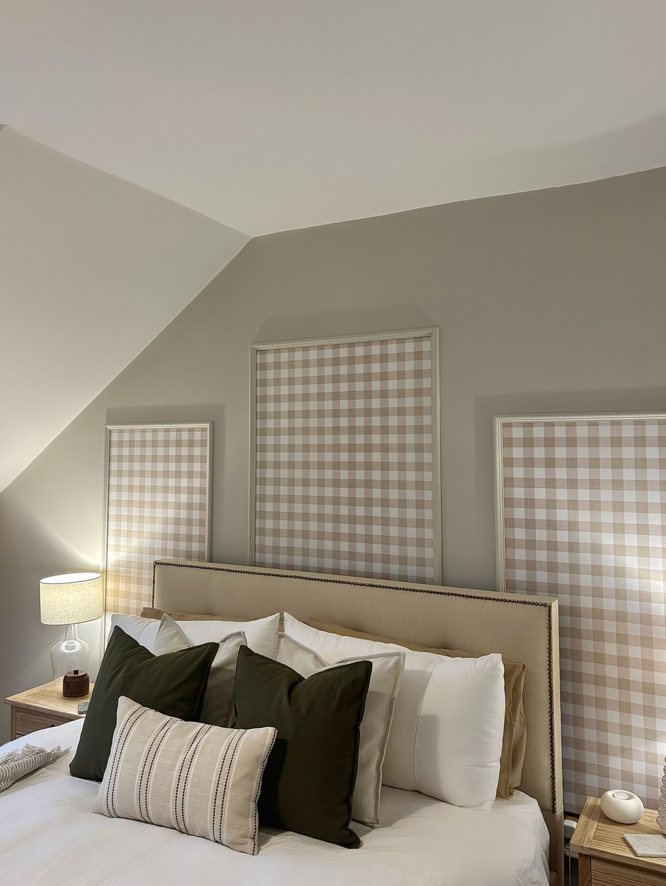 Bedroom featuring custom checkered wall pattern created using panel moulding with gingham wallpaper