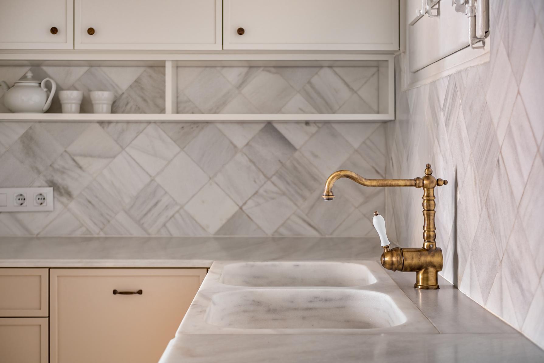 White marble diamond pattern panels near sink
