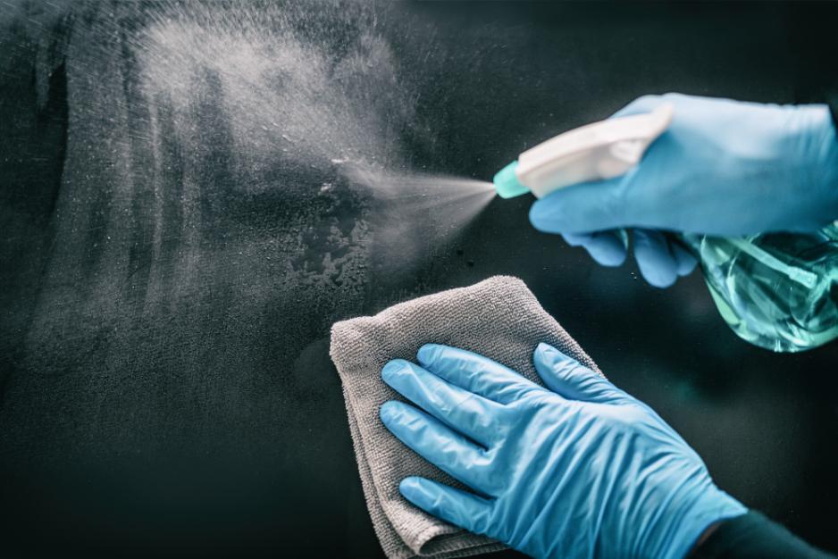 Cleaning kitchen wall panels with spray