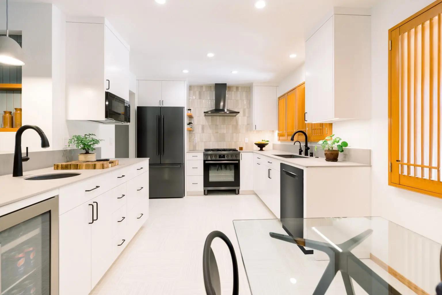 After renovation: Transformed Japandi kitchen sink wall with clean lines, natural wood and minimalist design