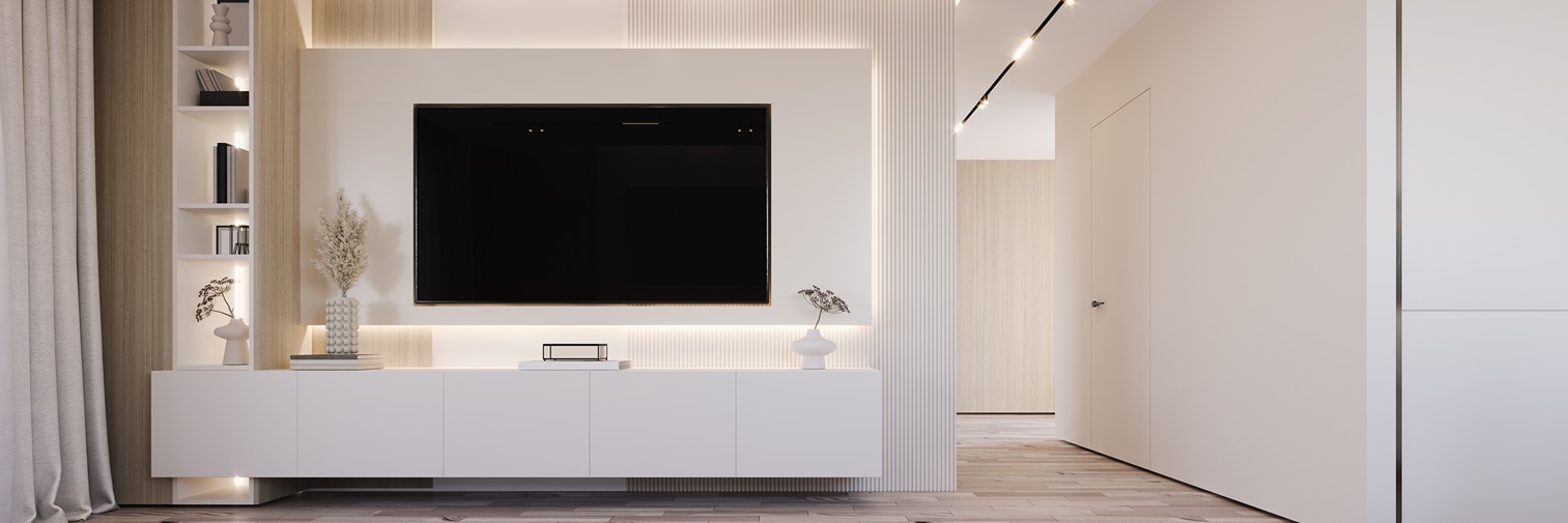 Crisp white minimalist media wall framed by LED lighting with built-in shelving.